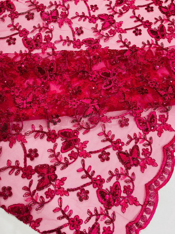 Fuchsia Corded Lace/Small Butterfly Design Embroidered with Sequin on a Mesh Lace Fabric.