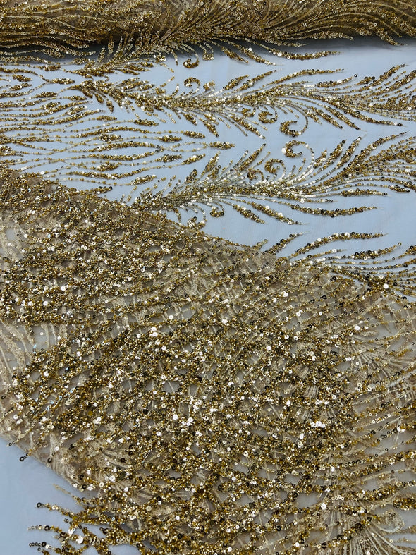 Gold Feathers damask embroider and heavy beaded on a mesh lace fabric- Sold by the yard