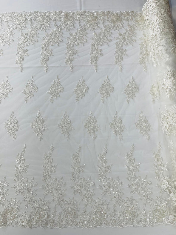 Ivory Floral design embroider and beaded on a mesh lace fabric-Wedding/Bridal/Prom/Nightgown fabric.