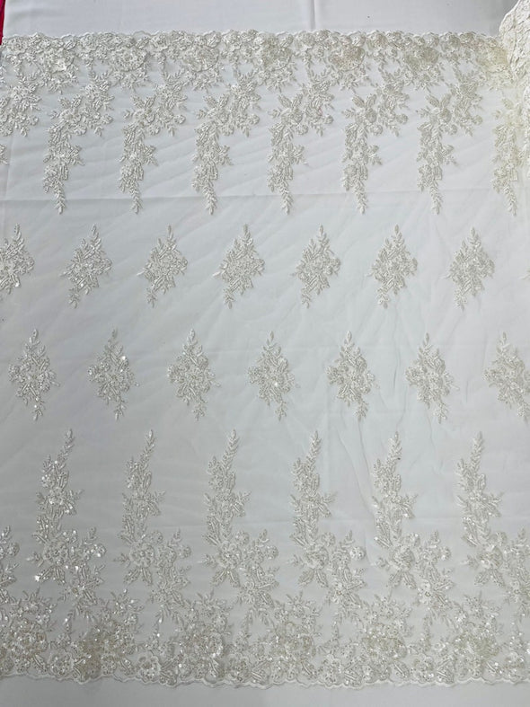 Floral design embroider and beaded on a mesh lace fabric-Wedding/Bridal/Prom/Nightgown fabric.