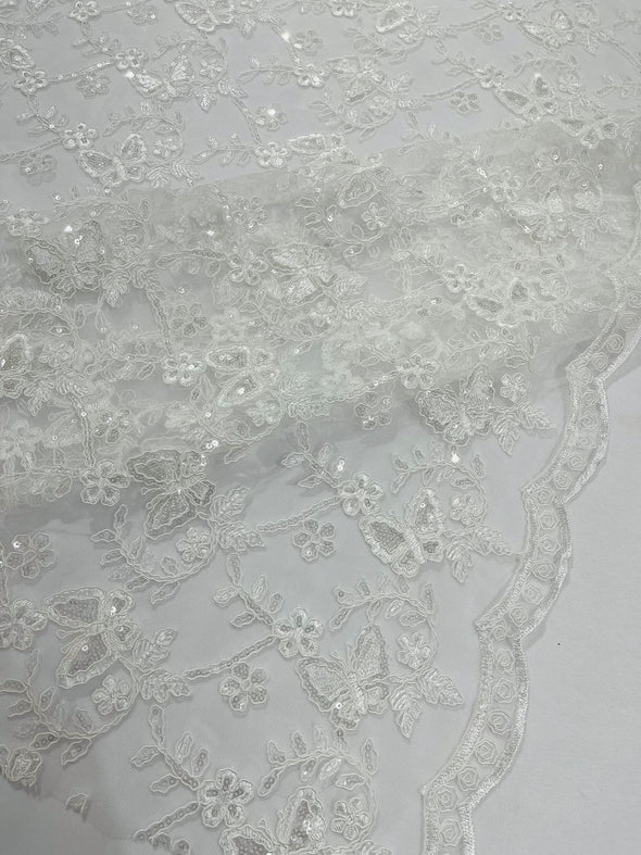 Ivory Corded Lace/Small Butterfly Design Embroidered with Sequin on a Mesh Lace Fabric.