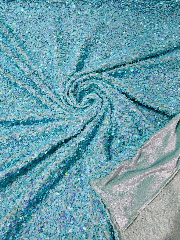 Iridescent 5mm sequins on a stretch velvet 2-way stretch, sold by the yard.