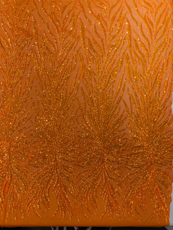 Orange Iridescent Phoenix Feather Design with Sequins Embroider on a Orange 4 way Stretch Mesh Fabric- Sold by the yard.