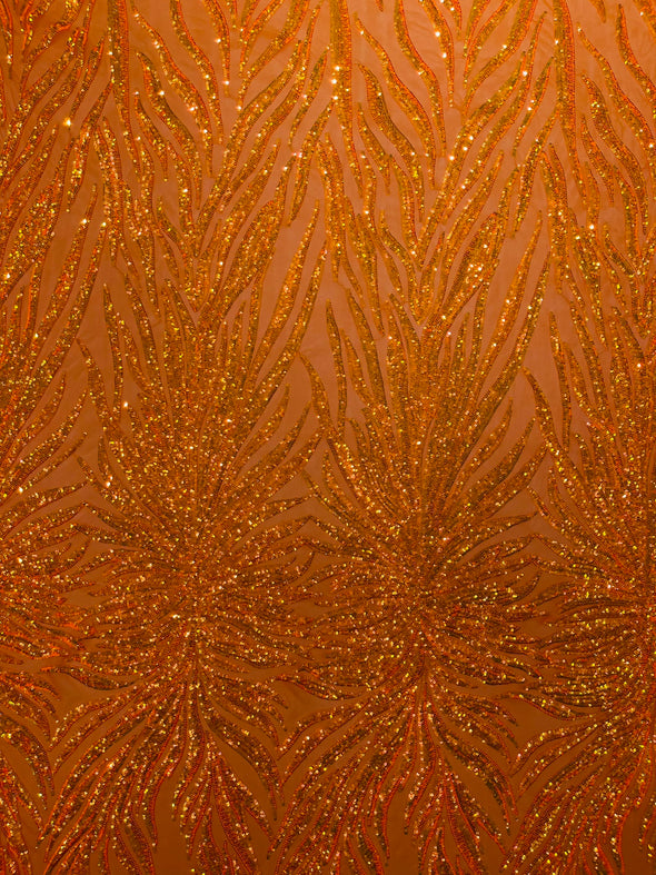 Orange Iridescent Phoenix Feather Design with Sequins Embroider on a Orange 4 way Stretch Mesh Fabric- Sold by the yard.