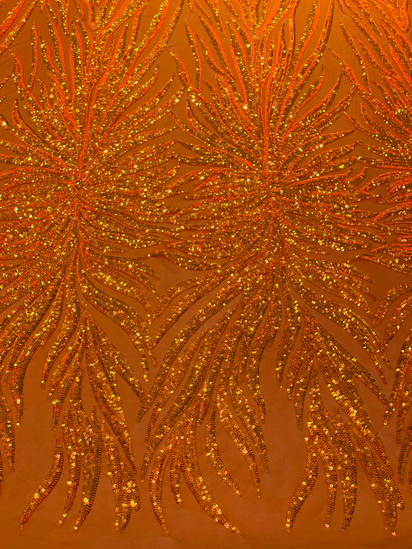 Orange Iridescent Phoenix Feather Design with Sequins Embroider on a Orange 4 way Stretch Mesh Fabric- Sold by the yard.