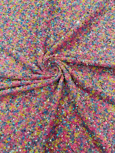 Multi color Confetti all over shiny sequins on pink stretch velvet , Sold by the yard