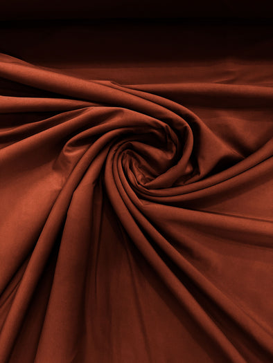 Rust ITY Fabric Polyester Knit Jersey 2 Way Stretch Spandex Sold By The Yard