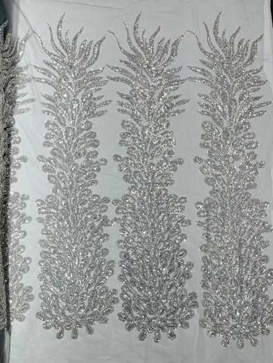 Silver New Vegas heavy beaded feather design embroidery on a mesh fabric-Sold by the panel