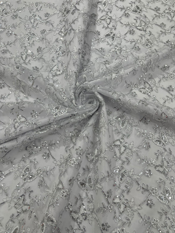 White Silver Corded Lace/Small Butterfly Design Embroidered with Sequin on a Mesh Lace Fabric.