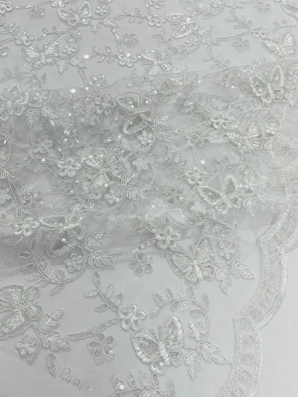 White Corded Lace/Small Butterfly Design Embroidered with Sequin on a Mesh Lace Fabric.