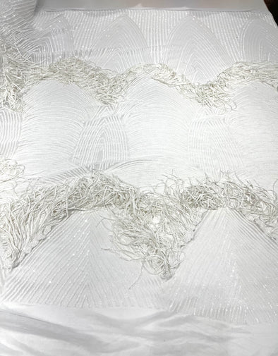 White fringe sequins design on a 4 way stretch mesh fabric-prom-sold by the yard.
