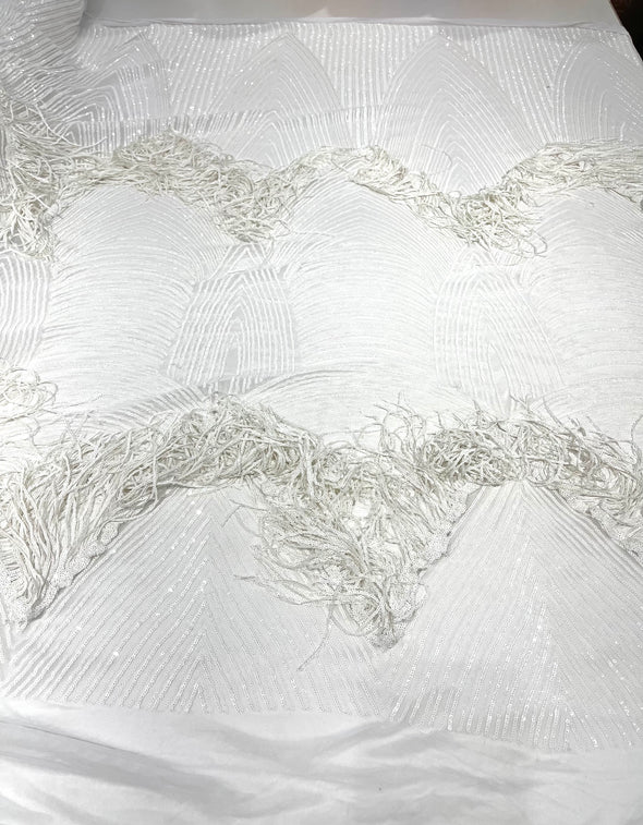 White fringe sequins design on a 4 way stretch mesh fabric-prom-sold by the yard.