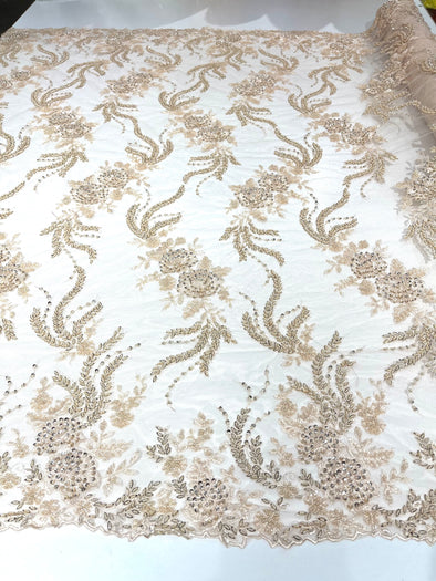 Light Peach flowers embroider and heavy beaded on a mesh lace fabric-sold by the yard.