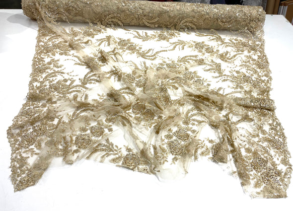 Light Gold flowers embroider and heavy beaded on a mesh lace fabric-sold by the yard.