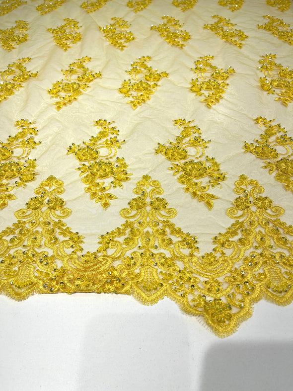 Yellow elegant hand beaded flower design embroider on a mesh lace-prom-sold by the yard