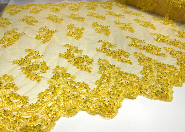 Yellow elegant hand beaded flower design embroider on a mesh lace-prom-sold by the yard