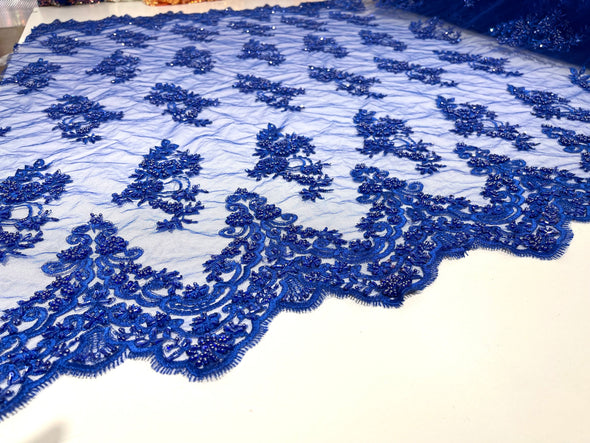 Royal Blue elegant hand beaded flower design embroider on a mesh lace-prom-sold by the yard