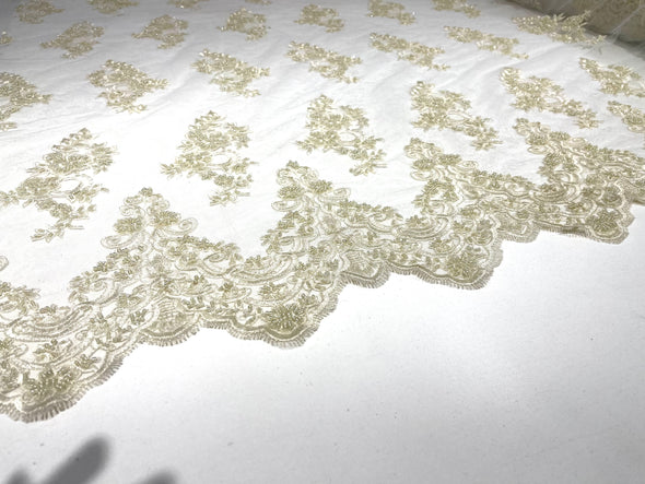 Ivory elegant hand beaded flower design embroider on a mesh lace-prom-sold by the yard