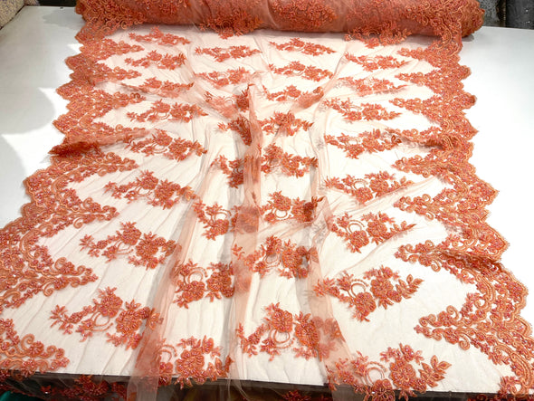 Coral elegant hand beaded flower design embroider on a mesh lace-prom-sold by the yard