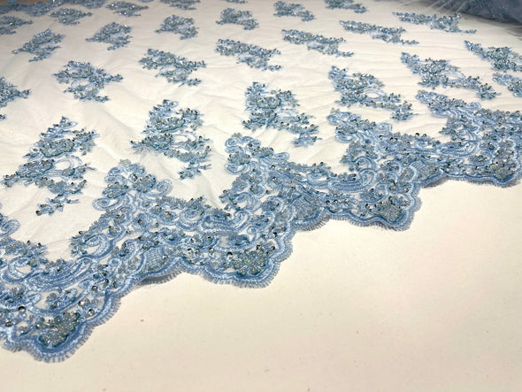 Light Blue elegant hand beaded flower design embroider on a mesh lace-prom-sold by the yard