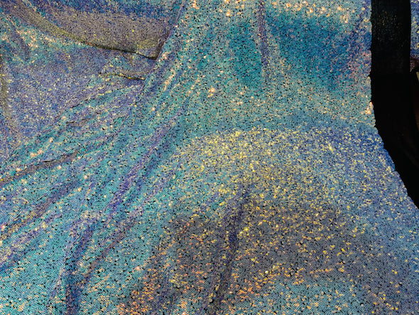 Aqua Iridescent Mini Glitz Sequins on a Black 4 Way Stretch Mesh-Sold  By The Yard.