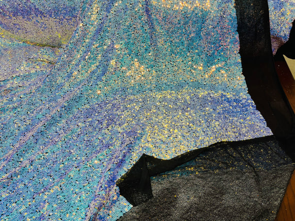 Aqua Iridescent Mini Glitz Sequins on a Black 4 Way Stretch Mesh-Sold  By The Yard.