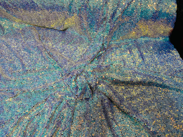 Aqua Iridescent Mini Glitz Sequins on a Black 4 Way Stretch Mesh-Sold  By The Yard.