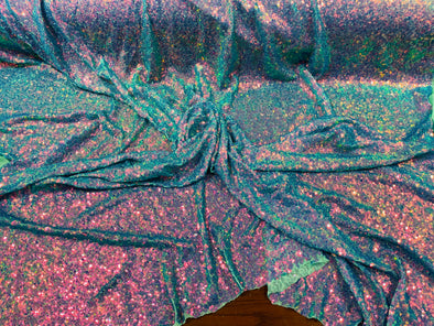 Purple  Iridescent Mini Glitz Sequins on a Mint 4 Way Stretch Mesh-Sold  By The Yard.
