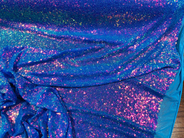 Purple/ Turquoise Iridescent Mini Glitz Sequins on a Turquoise 4 Way Stretch Mesh-Sold  By The Yard.