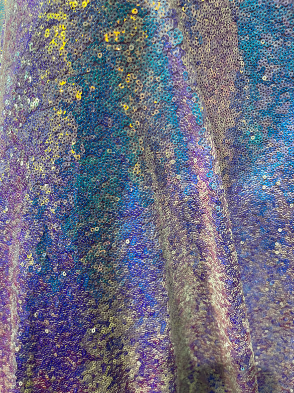 Aqua Iridescent Mini Glitz Sequins on a Lilac 4 Way Stretch Mesh-Sold  By The Yard.