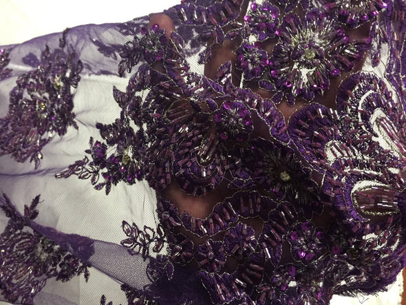 Purple flowers embroider and heavy beaded on a mesh lace fabric-sold by the yard-