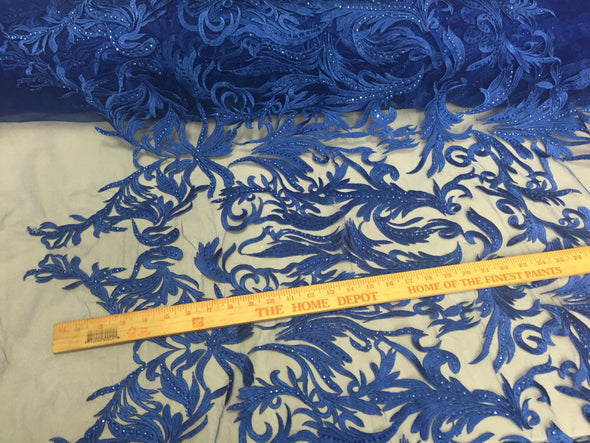 Rotal blue rhinestone vines embroider on a mesh lace fabric -sold by yard