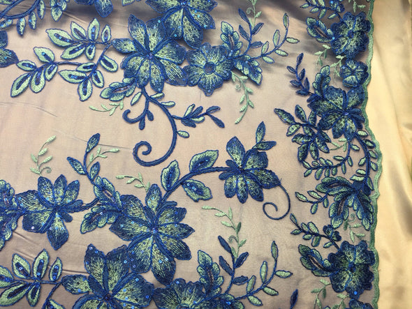 Royal blue/ aqua modern flower design embroider on a mesh with sequins and metallic cord-prom-nightgown-sold by the yard.