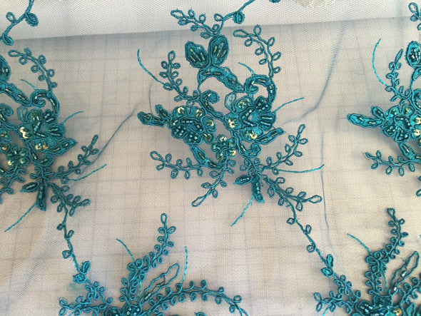 Teal marvy flower design embroider with glass heads and sequins on a mesh lace-prom-nightgown-decorations-sold by the yard.