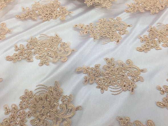 Champagne flower lace corded and embroider with sequins on a mesh. Wedding/bridal/prom/nightgown fabric. Sold by the yard.