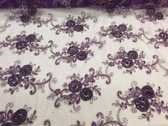 Purple/silver 3d flowers embroider with sequins on a purple mesh lace. Wedding/bridal/prom/nightgown fabric. Sold by the yard.