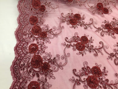 Burgundy/silver 3d flowers embroider with sequins on a burgundy mesh lace. Sold by the yard. Sold by the yard.