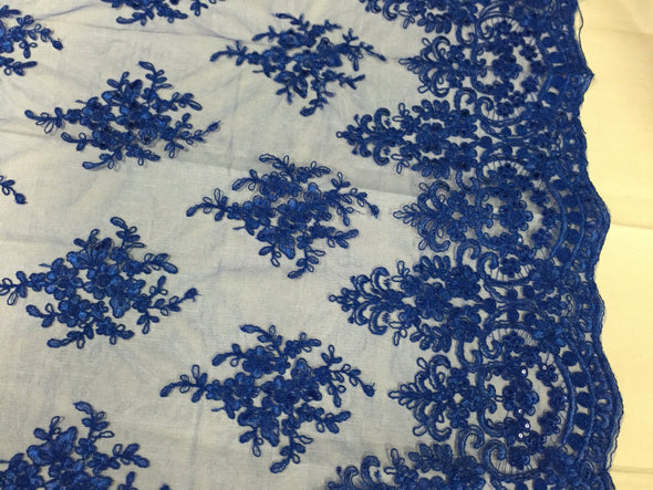 Royal Blue royal flowers embroider with sequins and corded on a mesh lace-Sold by the yard