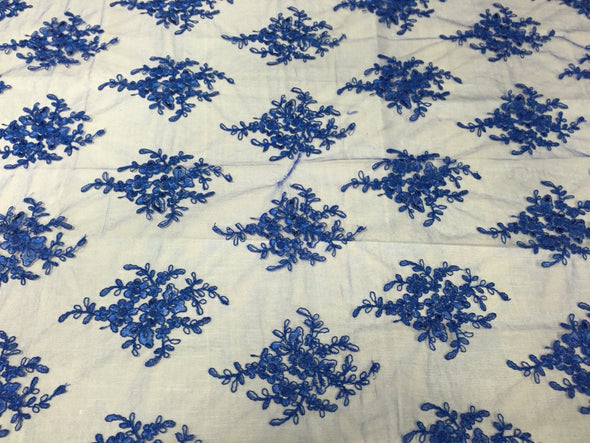 Royal blue royal flowers embroider with sequins and corded on a mesh lace-yard
