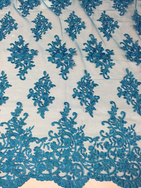 Turquoise classy pailsey flowers embroider on a mesh lace -yard