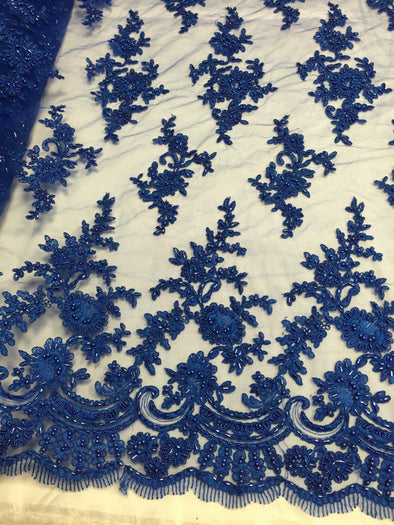 Royal blue appealing flower design embroider and beaded on a mesh lace-prom-nightgown-decorations-dresses-sold by the yard.