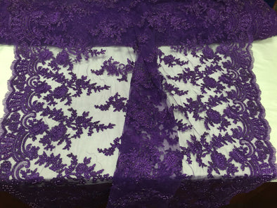 Purple appealing flower design embroider and beaded on a mesh lace-prom-nightgown-decorations-dresses-sold by the yard.
