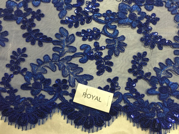 Royal blue corded flowers embroider with sequins on a mesh lace fabric-sold by the yard-