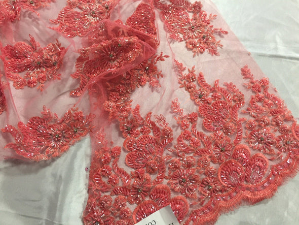 Dk-coral flowers embroider and heavy beaded on a mesh lace fabric-sold by the yard-