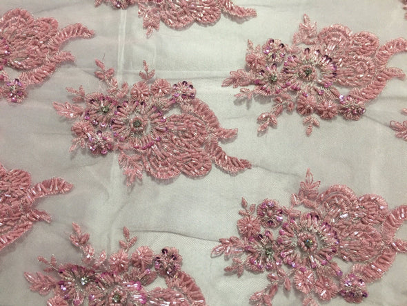 Dusty rose flowers embroider and heavy beaded on a mesh lace fabric-sold by the yard-