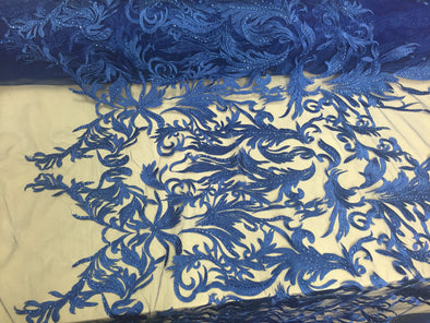 Rotal blue rhinestone vines embroider on a mesh lace fabric -sold by yard