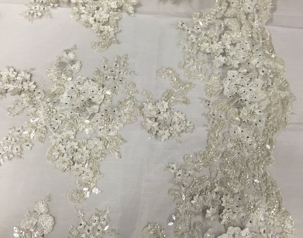 Ivory lavish 3D flowers embroider with sequins and beaded on a mesh lace-prom-nightgown-bridal-wedding-decorations-dresses-sold by the yard.
