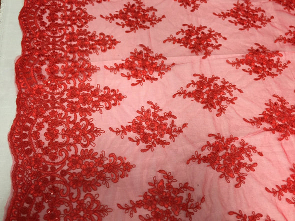 Red royal flowers embroider with sequins and corded on a mesh lace- yard