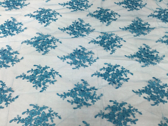 Turquoise royal flower design embroider with sequins and corded on a mesh lace -yard