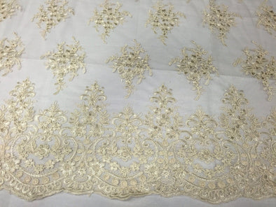 Dark ivory royal flower design embroider widh sequins and corded on a mesh lace -yard